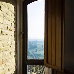 Zafferano Rooftop Terrace Tower House Апартаменты Сан-Джиминьяно